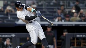 New York Yankees' Aaron Judge homers on a fly ball to right center field, his 500th extra base hit, during the first inning of a baseball game against the Arizona Diamondbacks, Thursday, April 3, 2025, in New York. (AP Photo/Julia Demaree Nikhinson)