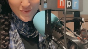 Samantha Pangborn at a radio microphone