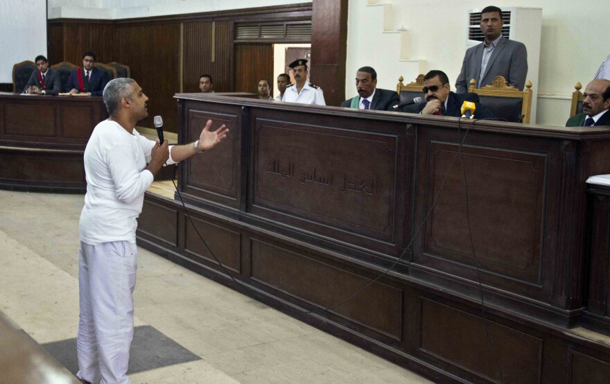 Al-Jazeera's Mohamed Fahmy pleads his case to the judge in Cairo last May. Fahmy is one of three Al-Jazeera journalists convicted of terrorism charges.