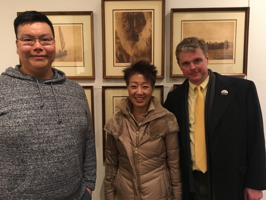 Museum curator Ben Charles, NEA Chairman Jane Chu, and Alaska State Council on the Arts Chair Benjamin Brown tour the Bethel Cultural Center's museum.