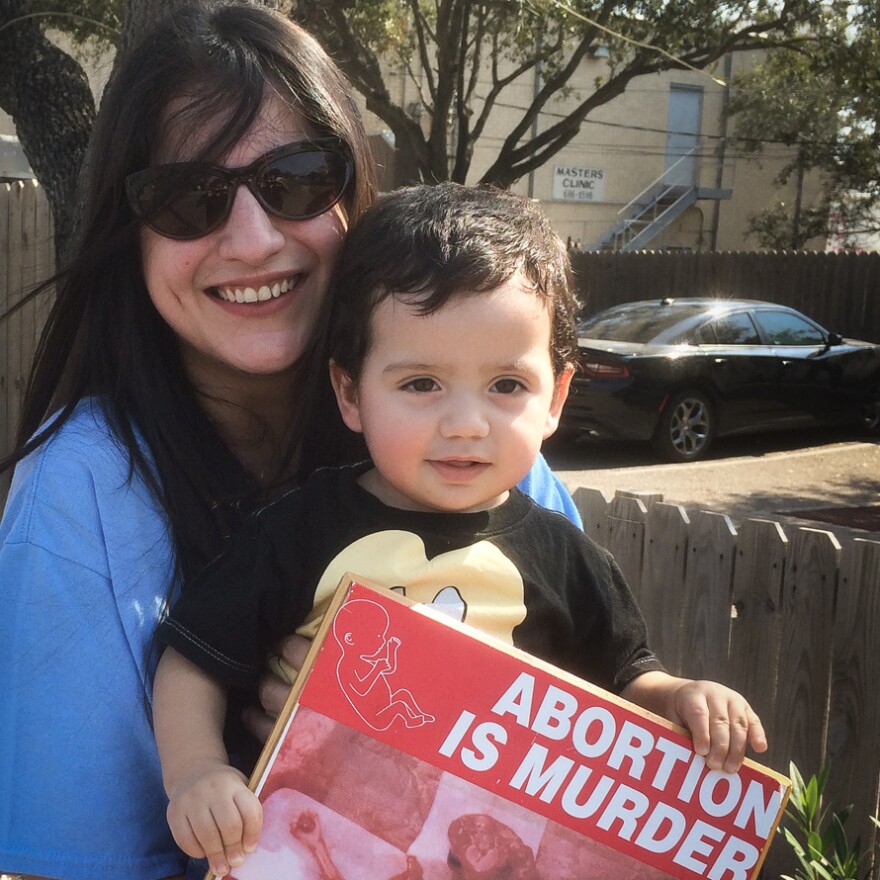 Mercedes Soto says she was considering an abortion the first time she came to the Whole Woman's Health clinic. She decided against the procedure, became an anti-abortion activist, and now protests outside the clinic with her son, Samson.