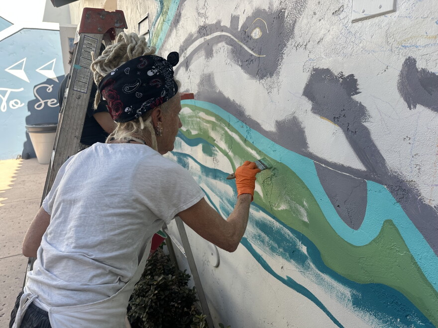 The artist is creating a 20 foot long, eight foot high mural which shows some of the sea life off of Ventura County's coastline.