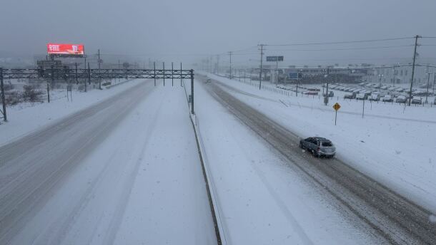 Independence Boulevard at Idlewild Road is covered with snow at 4:30 p.m., Jan. 31. 2026.