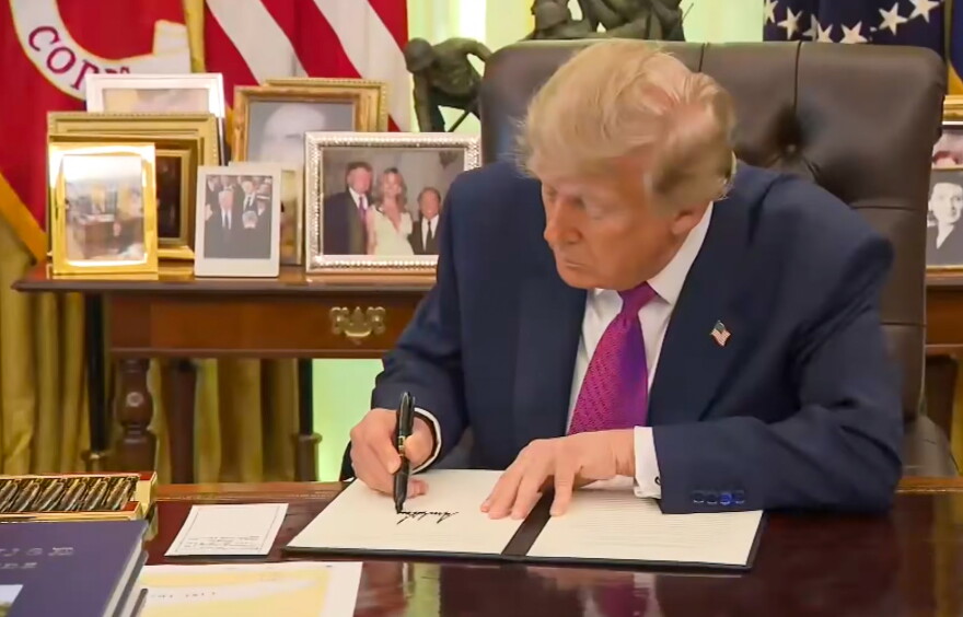 Donald Trump signs the executive order to rename Lake Ontario to 'Lake America'