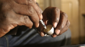 A man draws heroin into a syringe. Democrats in Congress are working to halt opioid legislation in an attempt to make the laws better.