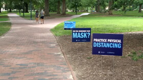 COVID safety signs on the quad at UNC - Chapel Hill.