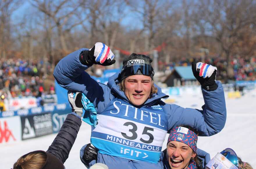 Gus Schumacher celebrates his World Cup win in Minneapolis on Sunday. (Nathaniel Herz for FasterSkier)