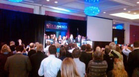 Rick Santorum speaks to his campaign gathering in Grand Rapids.