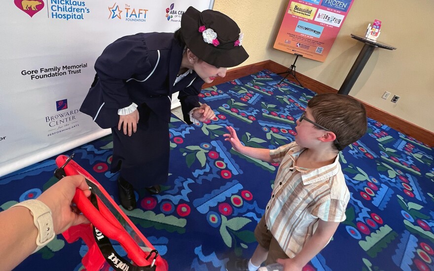Benjamin Kores meets a cast member of Mary Poppins at the Broward Center for the Performing arts in July 2025.