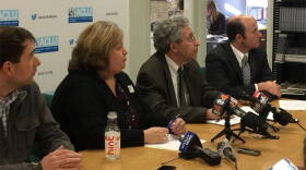 ACLU of Indiana Legal Director Ken Falk (second from right) and Exodus Refugee Immigration Executive Director Carleen Miller (second from left) discussed the lawsuit at a press conference Tuesday.