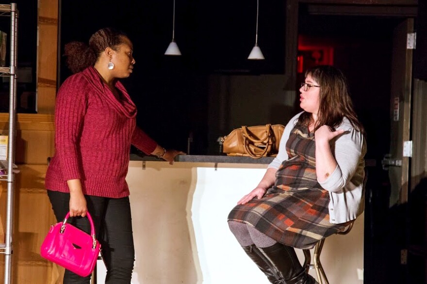 In this March 2017 photo, Taleesha Cutaruh as Amy and Trisha Duffin as Vanessa clash over Amy's weight loss and their waning friendship in the play "Fat."