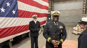 Cmdr. James Koffi, captain of USS Truxtun, is in the hanger bay of the destoryer, prior to depature.