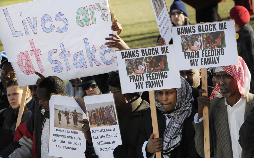 Somali-Americans rally in Minnesota in 2012, after the only bank that supported the money-exchange system called <em>hawala</em> withdrew from those transactions. Other banks eventually stepped in to fill the demand, but one of the last to facilitate the transfers plans to stop doing so at the end of the month.