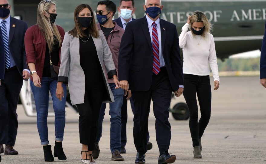 Vice President Pence and his family arrive on Marine Two at Andrews Air Force Base, Md., on Monday as he departs for Utah ahead of the vice presidential debate.