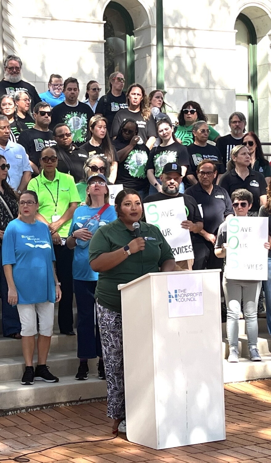 Ivory Anguiano, a 17-year-old senior at the Young Women's Leadership Academy, spoke at the rally about her experience with Good Samaritan Community Services.