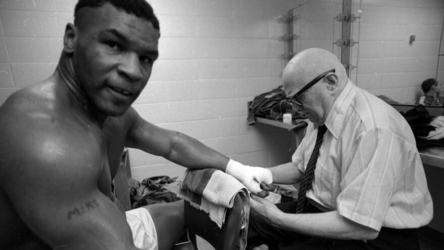 Tyson and D'Amato prepare for the boxer's first pro fight.