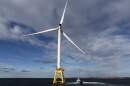 A Block Island Wind Farm turbine operates, Dec. 7, 2023, off the coast of Block Island, R.I., during a tour organized by Orsted.