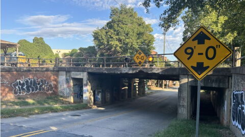Two photos show low-clearance railroad trestles over roadways, with yellow height warning signs posted near each bridge.