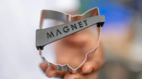 A student holds up a finished cookie cutter during graduation from MAGNET's Summer Manufacturing Academy in the organization's Cleveland headquarters on Thursday, July 25, 2024.