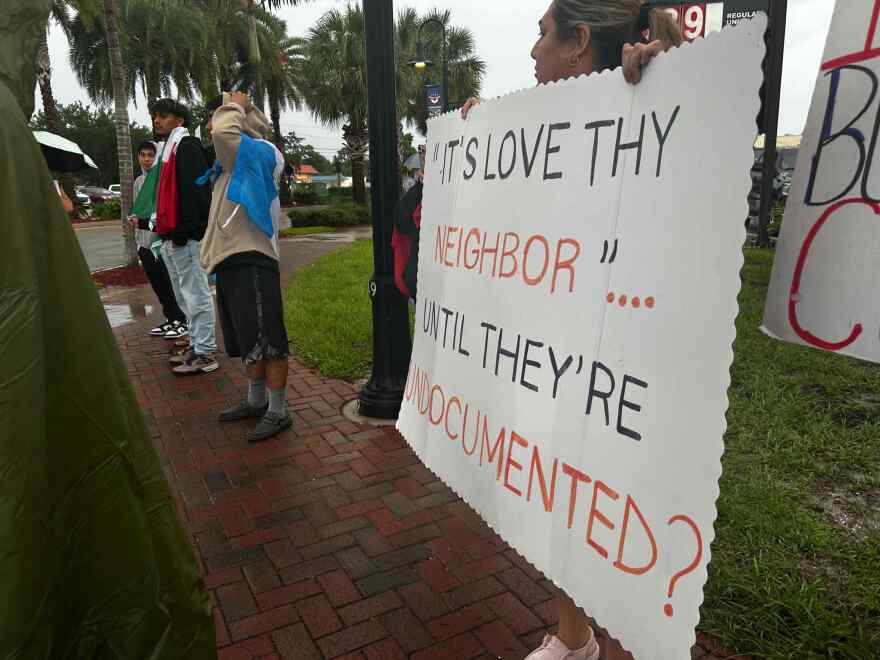Protesters gathered in Bonita Springs in July to oppose rising detentions and deportations.