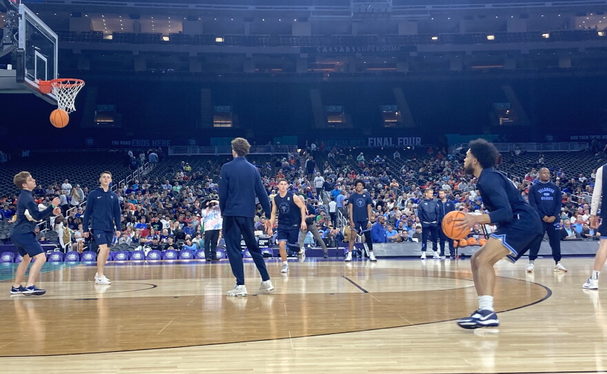 Daniels, right, practicing the day before the Final Four game against Kansas.