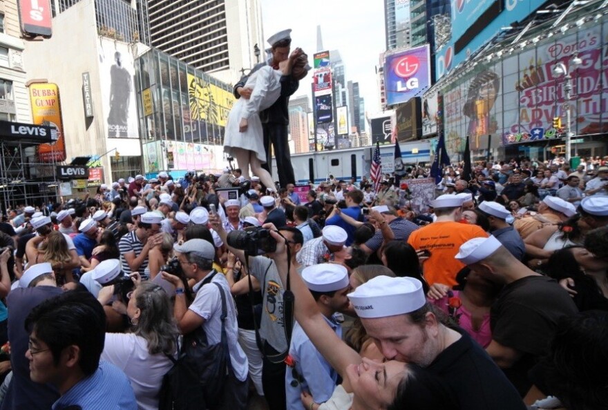 The 25-foot statue inspired by the photograph "V-J Day in Times Square" is on display in New York City. The statue will be on display in Royal Oak until the end of the year.