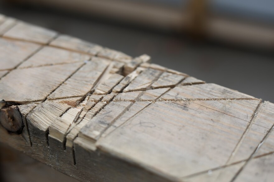 Saw cuts mark a sawhorse on Friday, Oct. 15, 2021, at a house renovation in Ashland, Missouri.