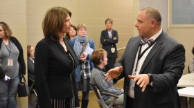 Rep. Cheri Bustos, left, on a tour of the OSF COVID-19 Pandemic Digital Response Center in Peoria on Wednesday, March 18, 2020. Dr. John Vozenilek, VP and Chief Medical Officer of Jump Trading Simulation and Education Center, explains how it works.