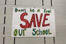 A pro-Danville School poster was taped to the wall at at Danville School Board meeting on Oct. 9, 2025. A citizen petition seeks a referendum on whether to close the high school.