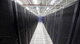 In this Aug. 29, 2014 photo, rows of servers are lined up at BlueBridge Networks in Cleveland. The company, which has a data center near Playhouse Square in downtown Cleveland a larger facility in suburban Mayfield Heights, is one of the growing number of data centers are choosing to locate in and around the city.