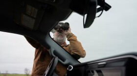 Troy Jones looks for bald eagles out on his family's land near the proposed solar site in Harrisburg, Ore. on March 6, 2026. Jones, an avid hunter and fisherman, has been leading Friends of Gap Road, the local group opposed to the solar project.