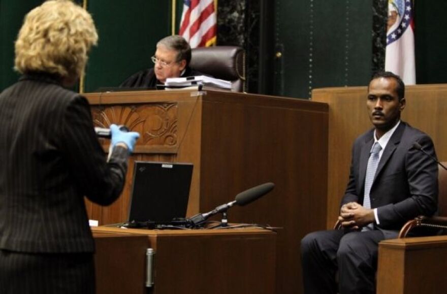 Reginald Clemons, pictured here during a 2012, court hearing, has pleaded guilty to the 1991 rape and murder of Julie and Robin Kerry.