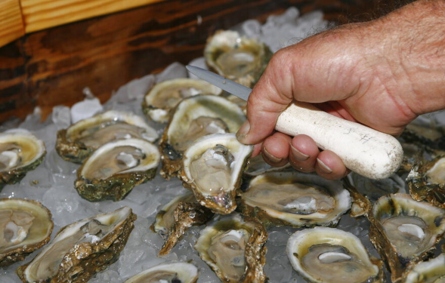 In this Aug. 13, 2013, file photo, oysters are displayed in Apalachicola. The Supreme Court has ruled unanimously for Georgia in its long-running dispute with Florida over water. The court on Thursday, April 1, 2021, rejected Florida’s claim that Georgia uses too much of the water that flows from the Atlanta suburbs to the Gulf of Mexico.