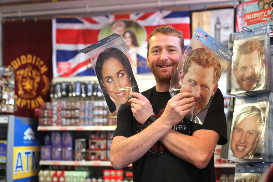 Mike Drummond of the Red Bus souvenir shop. Most customers now, he says, are foreign tourists "showing a lot of interest" in Saturday's much-anticipated wedding in Windsor, England, of Prince Harry to Meghan Markle.