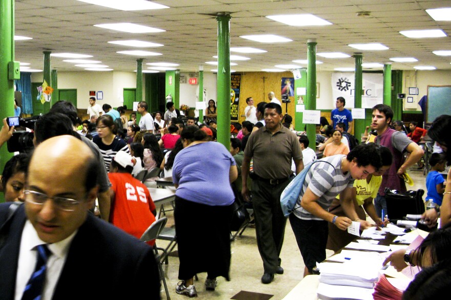 Potential applicants for President Obama's deferred action program gather at St. Mary's Church in New York for a workshop and legal advice.