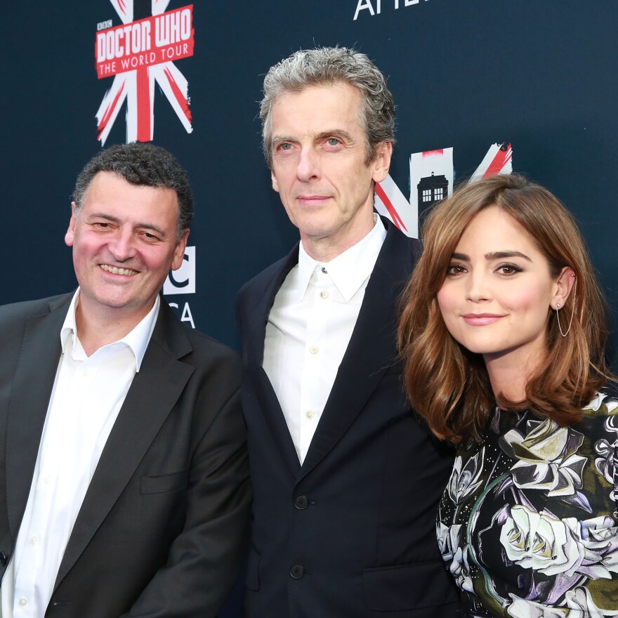 <em>Doctor Who</em> executive producer Steven Moffat (left) appears with series stars Peter Capaldi and Jenna Coleman in New York City.