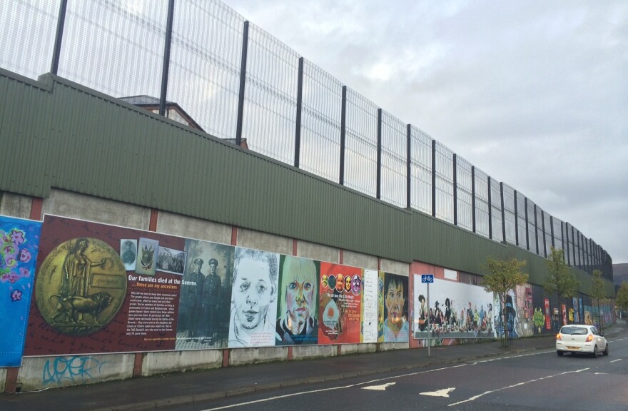 This is one of the peace walls in Belfast that separates Catholic and Protestant neighborhoods. The first barriers were built in 1969 and meant to last only six months, but they have multiplied over the years and stand to this day.