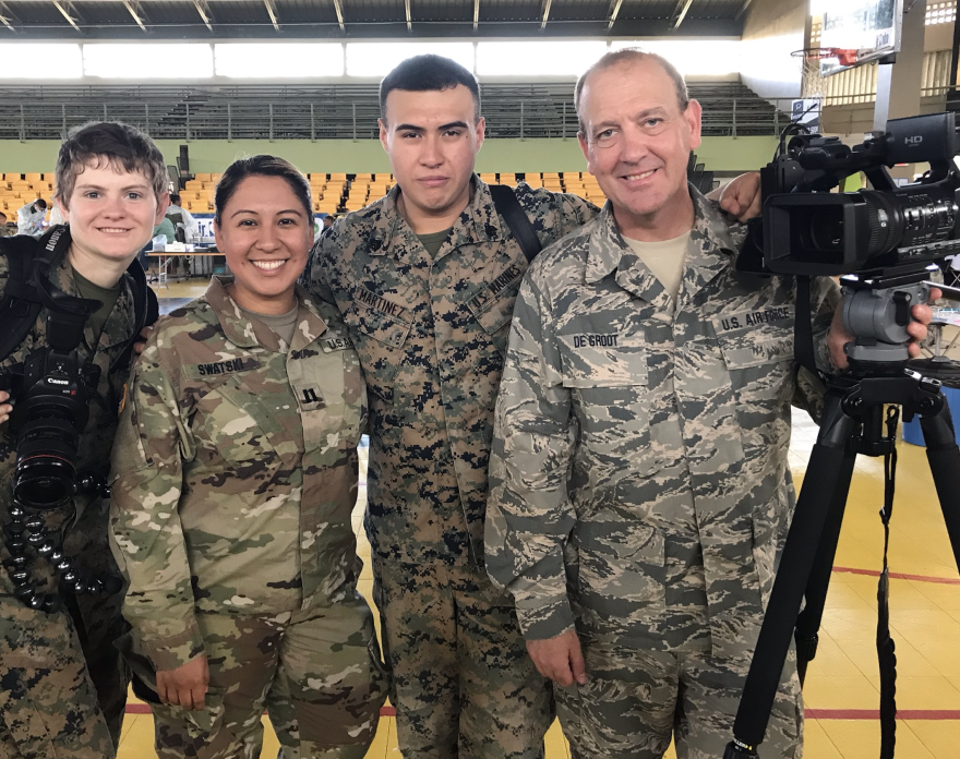 Lance Cpl. Faeth Webb USMC, Capt. Maria Swatski Delaware Army NG, Sgt. Andy Martinez USMC, Senior Master Sgt. Vincent De Groot Iowa Air NG