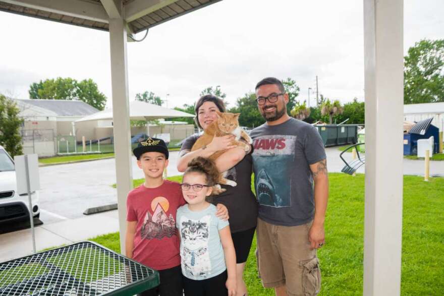 “Pumpkin,” a 15 lb. orange tabby cat adopted by her new family on July 31, was ultimately the adoption to break the all-time record. Photo: Orange County Animal Services