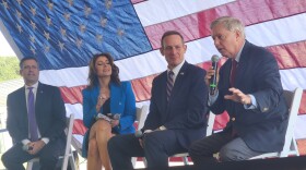 South Carolina GOP Sen. Lindsey Graham (right) speaks with N.C. Congressman Ted Budd (to his right) Monday in Charlotte.