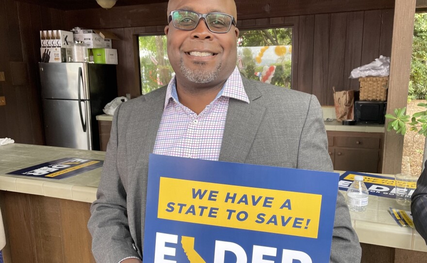 Chris McGee, the Westminster city chair for the Orange County Republican Party, attends an rally and fundraiser for gubernatorial candidate Larry Elder on Aug. 21.