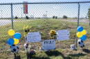 A memorial in front of the main gate at Stryker Sports Complex on Sunday. One child and one adult were killed, and multiple people were injured when a truck drove into a crowd at a youth soccer game and the children at the memorial witnessed it.