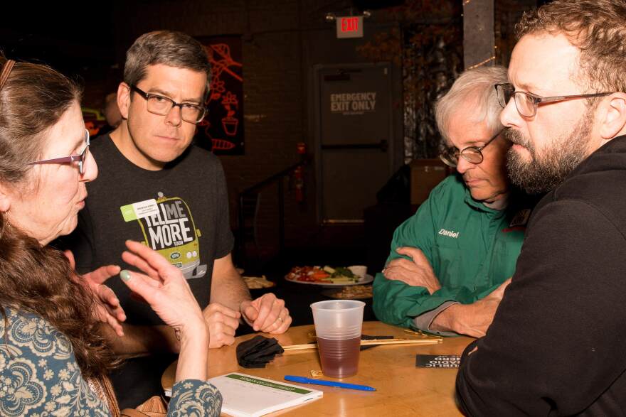 VPR's Brendan Kinney and Jonathan Butler chat with guests at the Burlington Tell Me More Tour event.