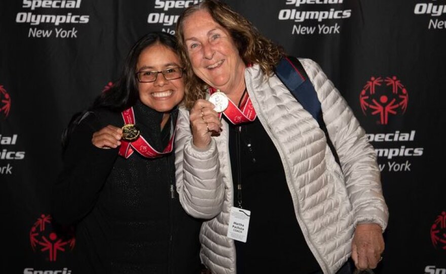 Special Olympics New York athlete Amanda Vito and her unified golf partner, Martha Pachuta.