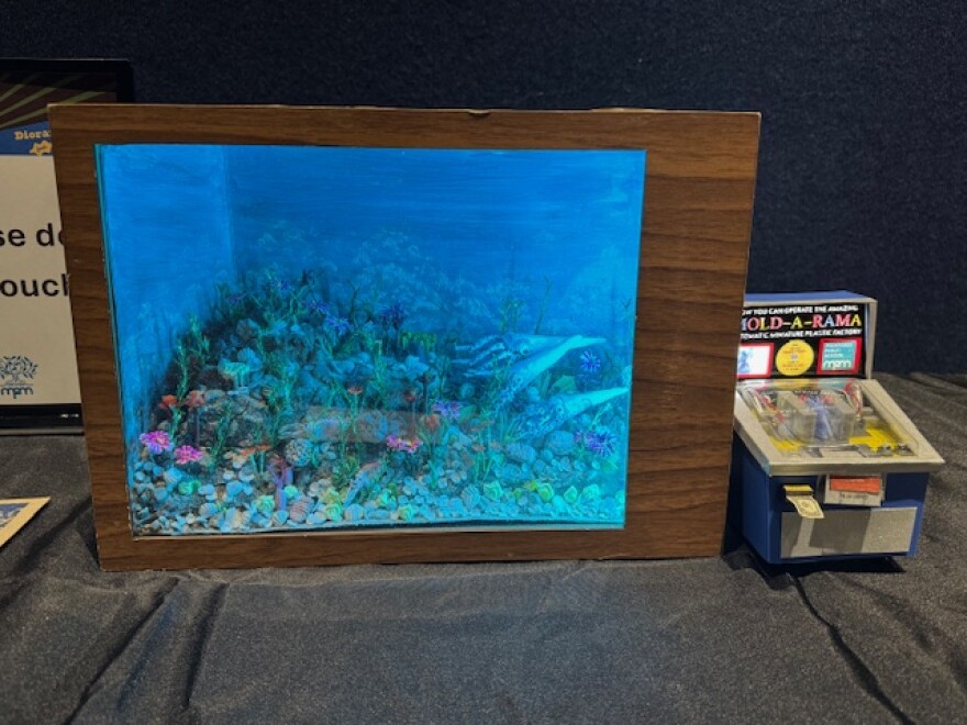 Angela Johnstad Beyer's diorama recreation of the Milwaukee Public Museum's Silurian ocean-life diorama, and a Mold-A-Rama machine.
