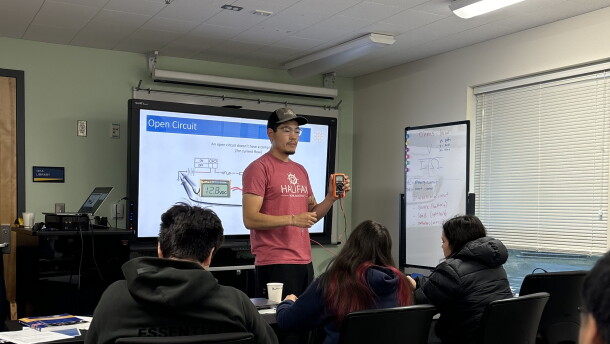 Instructor Triston Chaney teaches Introduction to Outboard Systems class at UAF Bristol Bay Campus's Applied Science Building. 