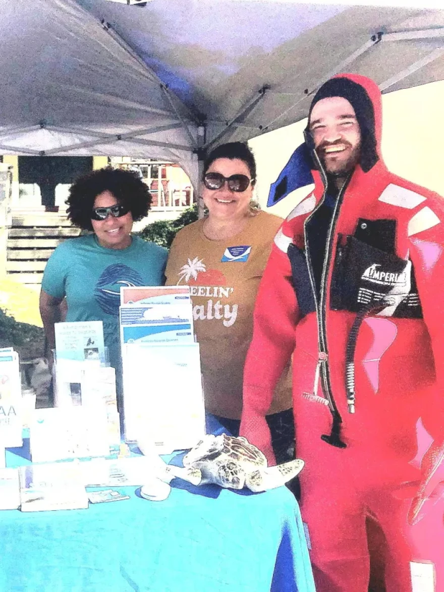Sarah Cierpich (center) at a NOAA outreach event in October.