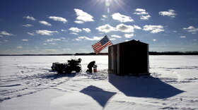 Could ice shanties like this one, built on Wisconsin's Lake Waubesa in 2005, be considered something of an economic indicator?