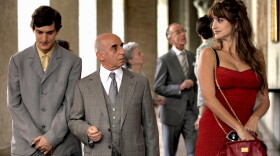Antonio the newlywed (Alessandro Tiberi, left), Uncle Paolo (Roberto Della Casa) and Anna the prostitute (Penelope Cruz) in one of <em>To Rome With Love</em>'s four independent stories. This one features Anna attempting to teach Antonio something about love.