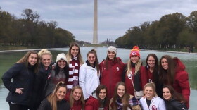 Members of the University of Oklahoma’s women’s gymnastics team visit the World War II Memorial after arriving in Washington to meet President Donald Trump to be honored for winning the NCAA National Championship on Nov. 22, 2019.
